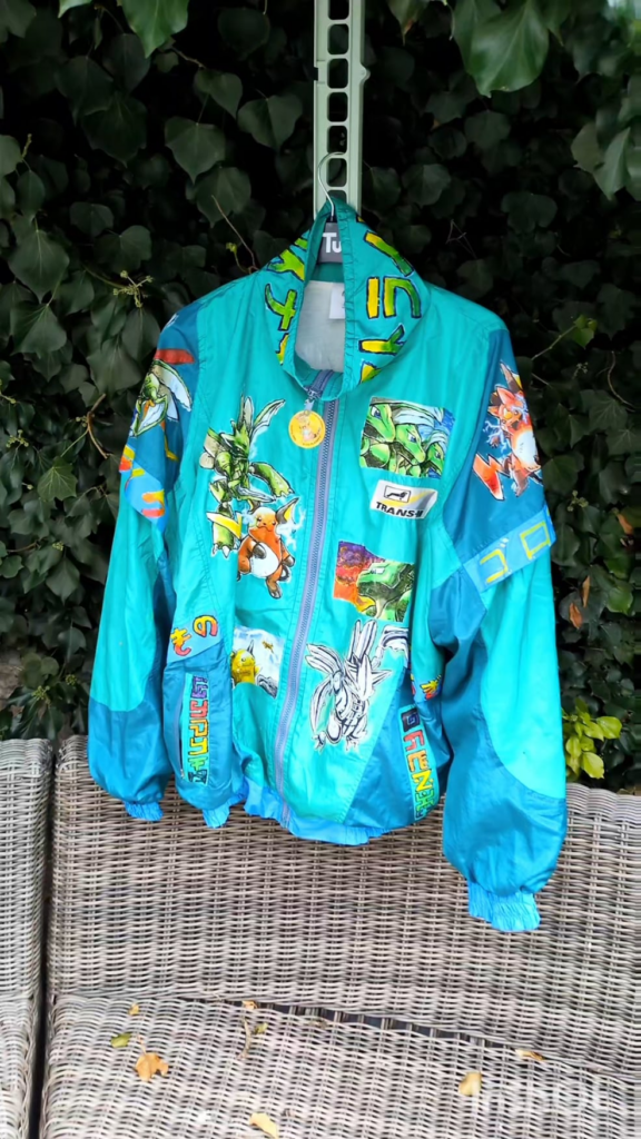 Transformed this old windbreaker into a pokemon festival jacket