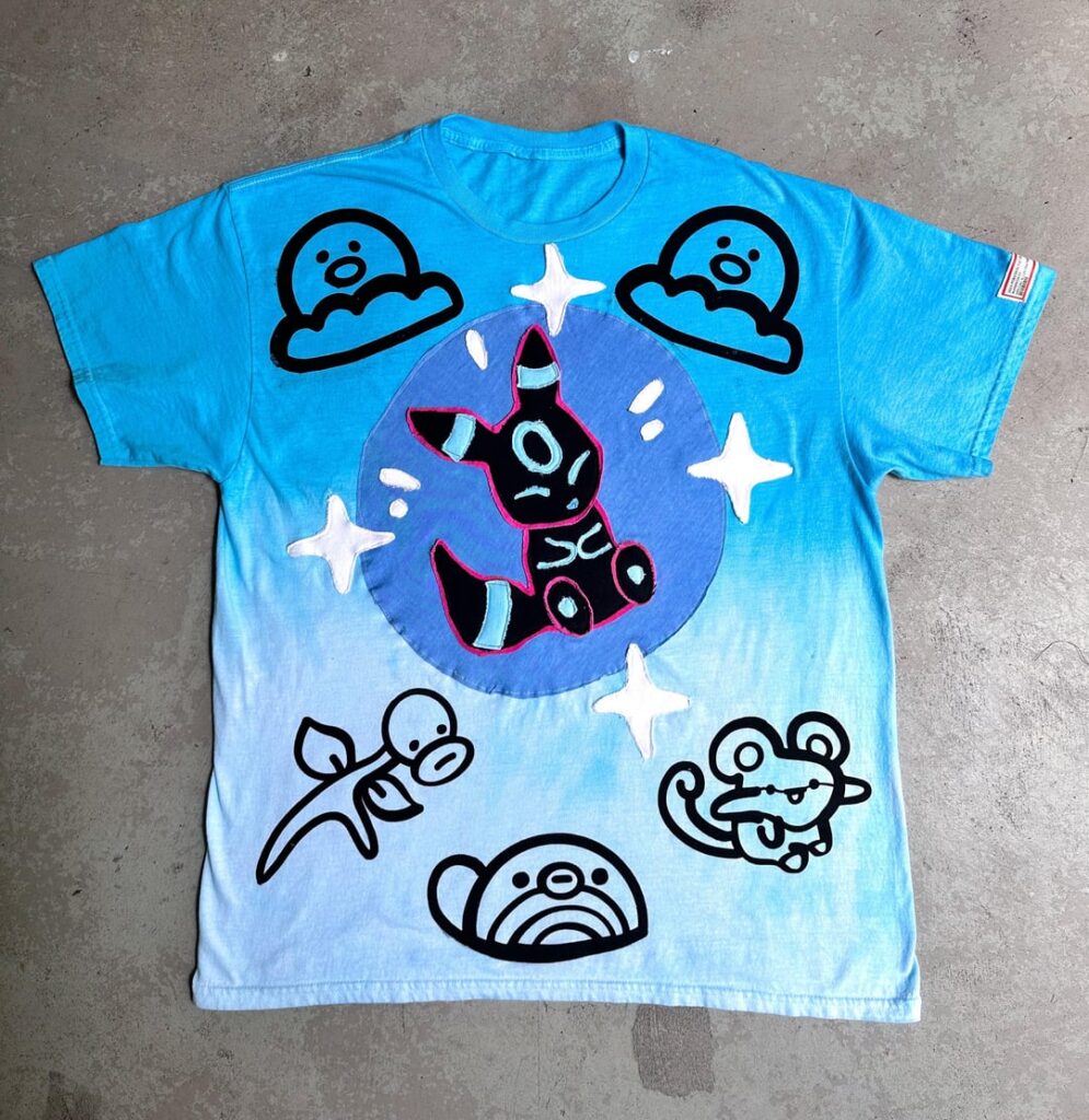 Made a Bubble Umbreon Vmax Tee shirt! Two cards I can’t afford into one artwork lol let me know what you think!