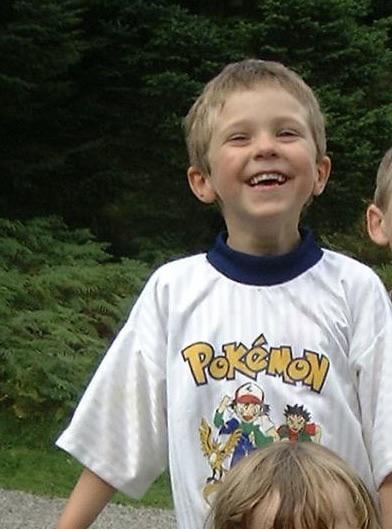 Trying to identify this t-shirt I had as a kid. It looks like it has a Yellow Articuno on it? Photo from around 2001