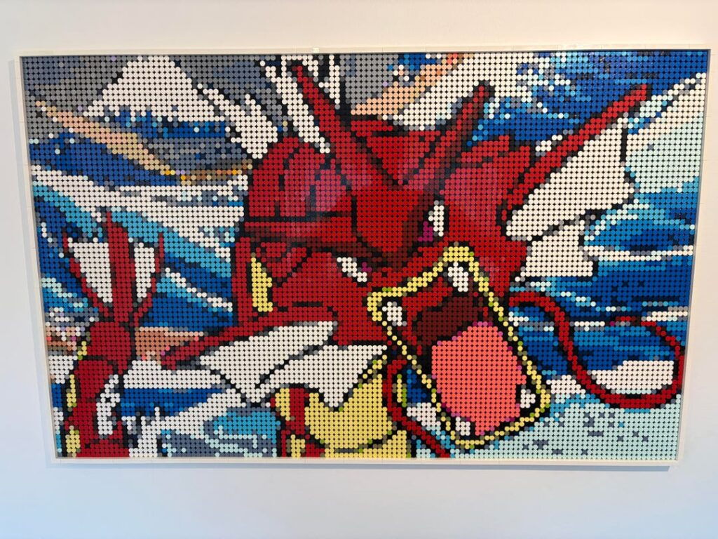 I built a shiny Gyarados Pokemon mosaic for my home office using 10,000+ Lego bricks