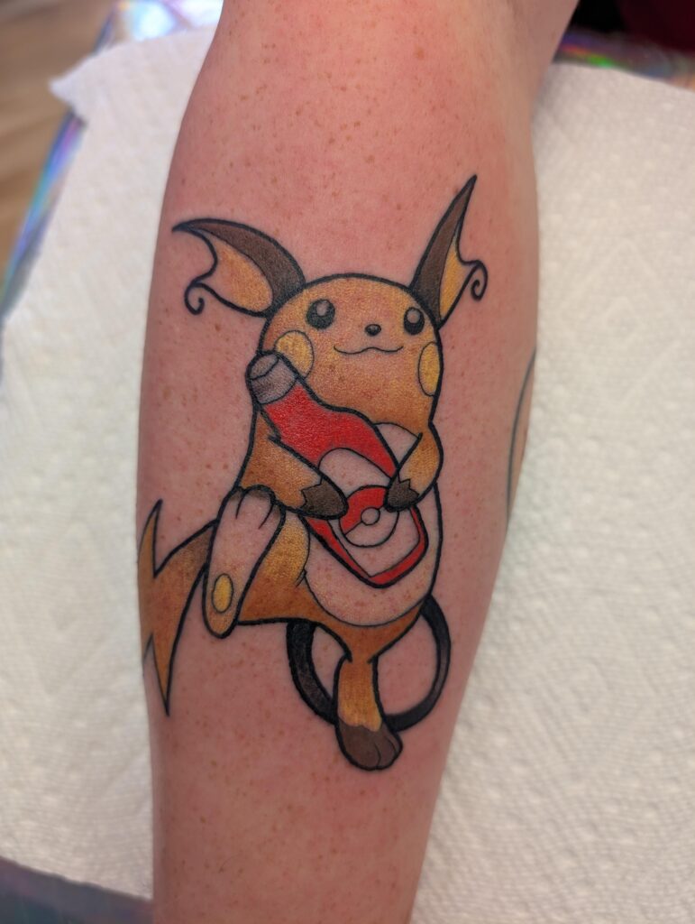 Tattoo I got a little while back. Raichu carrying ketchup :)