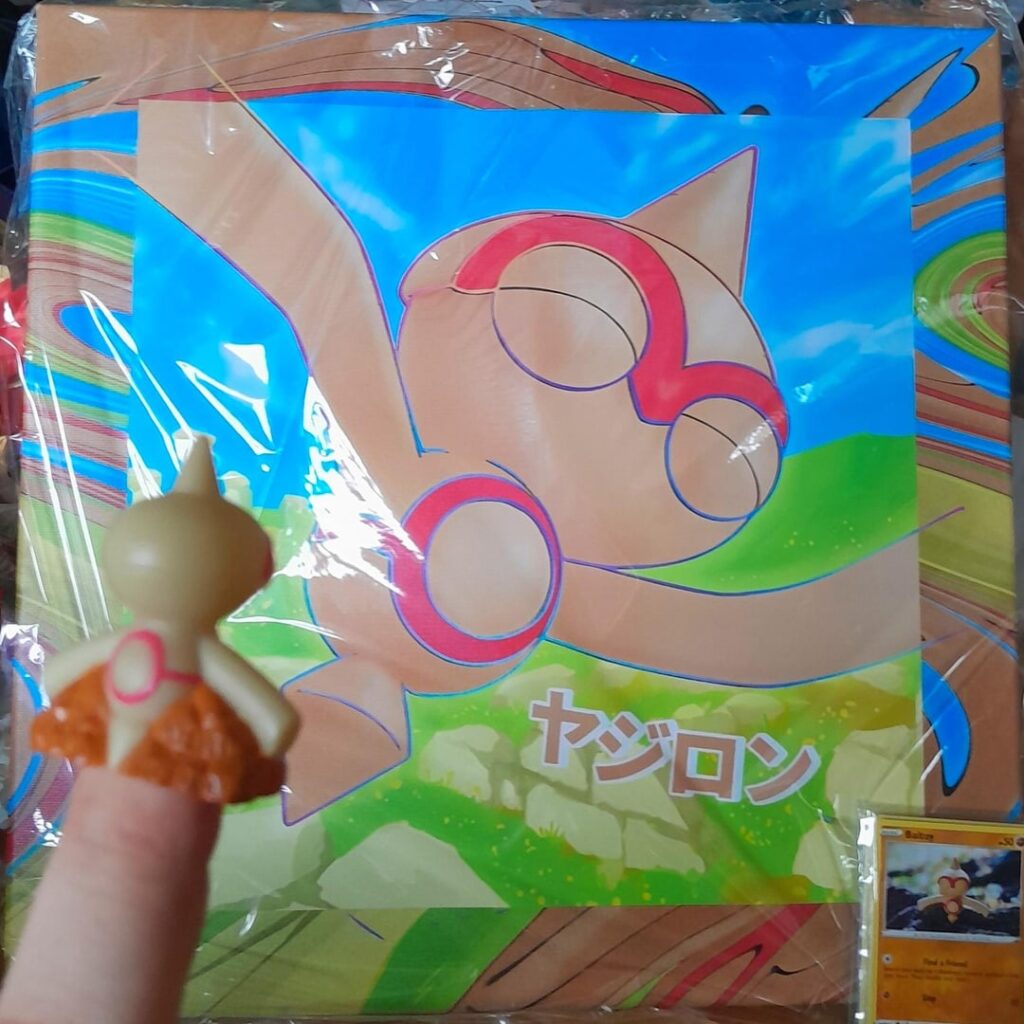 Got a Baltoy finger puppet and canvas print 🤎♥️