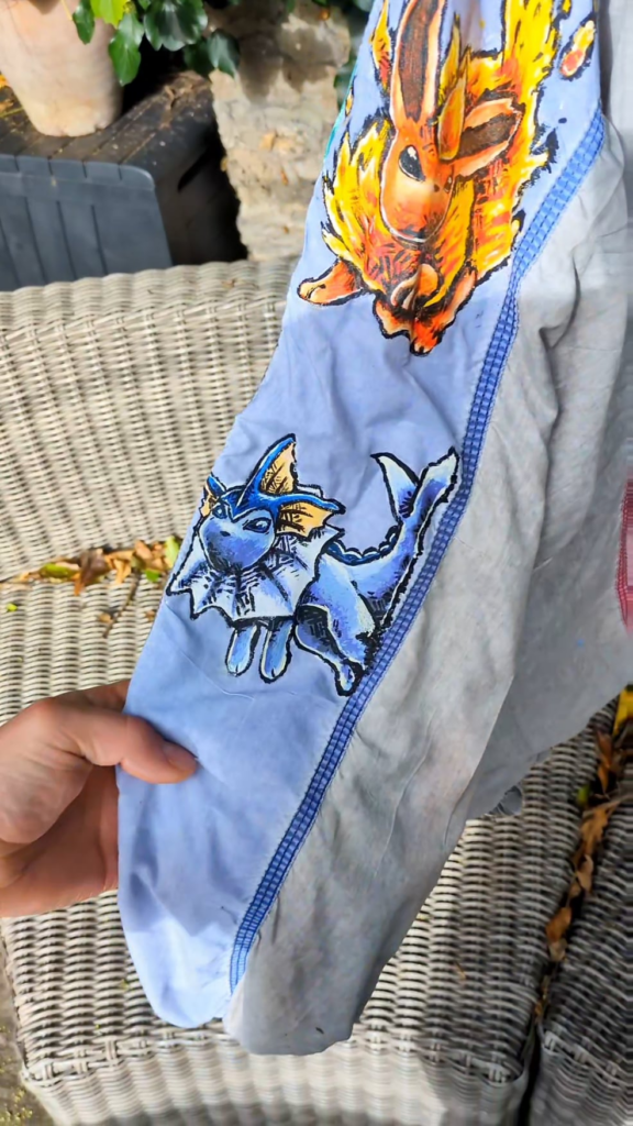 Another Pokémon windbreaker. This time themed around the original eeveeloutions. Hope you like! [OC]