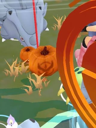 The pumpkins at gyms change based on what team is using that gym currently!!