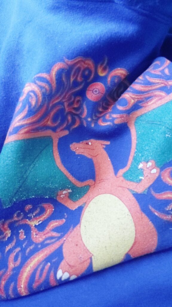 Playing Pokémon Go in a Pokémon hoodie because it's cold today. Keep me warm Charizard. 🔥🐉