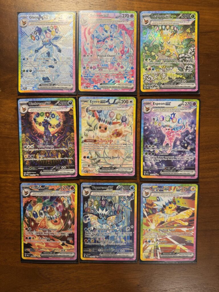 2nd day collecting and pulled a god pack from Prismatic Evolutions!