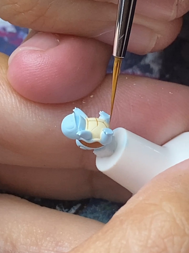 [OC] Painting a tiny Squirtle for my keycap. Watch till the end to see the result.