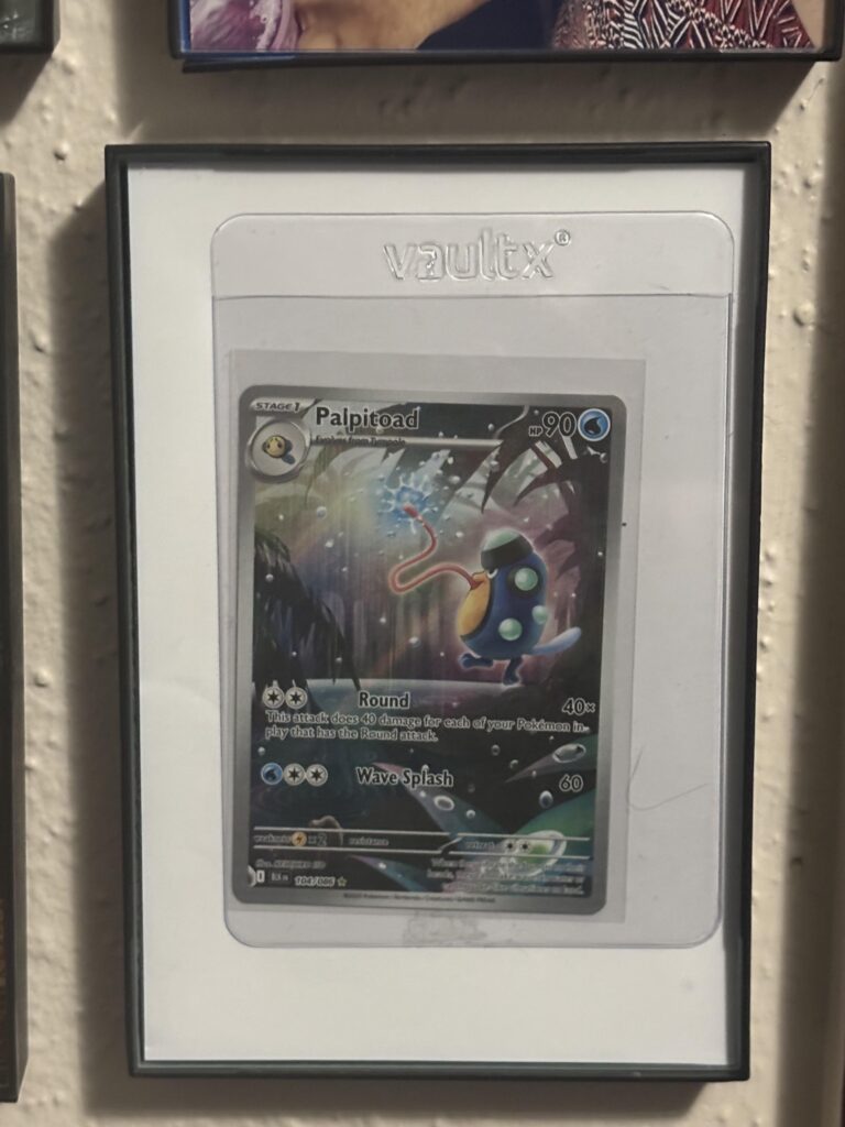 My mom got her first ever hit and decided to frame the card with the family photos 🤦‍♂️