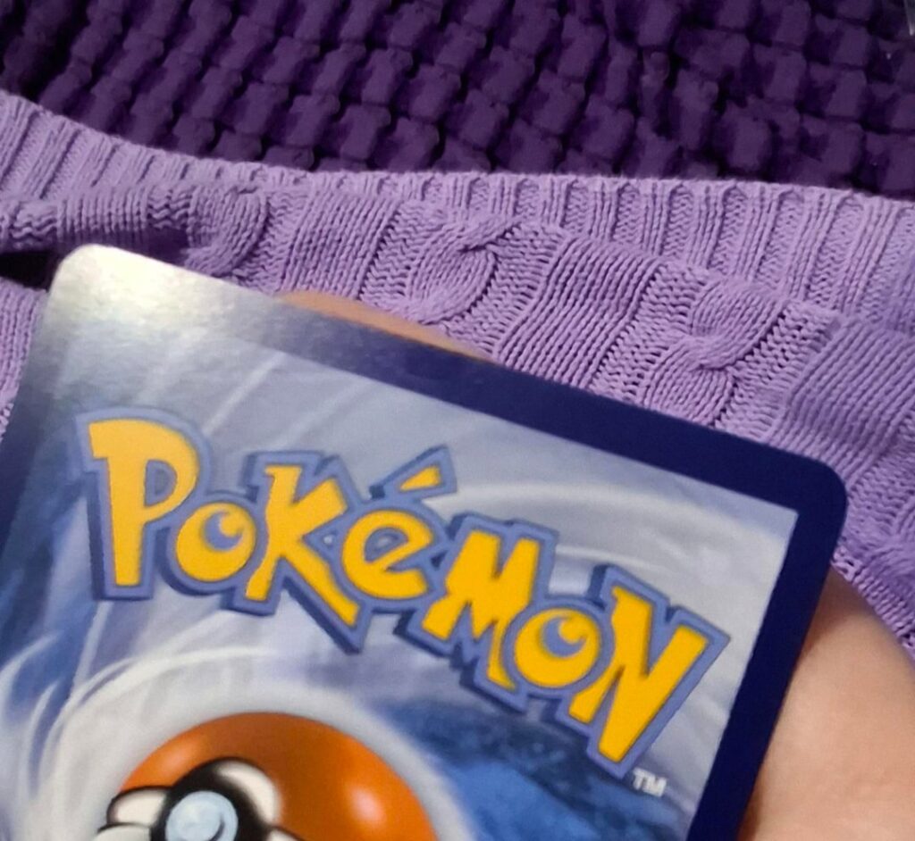 What is this darker patch on the back of the cards border???