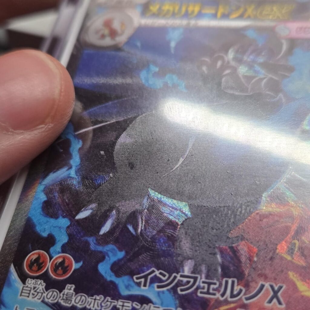 Our Charizard just arrived.. Is this a printing error or damage?