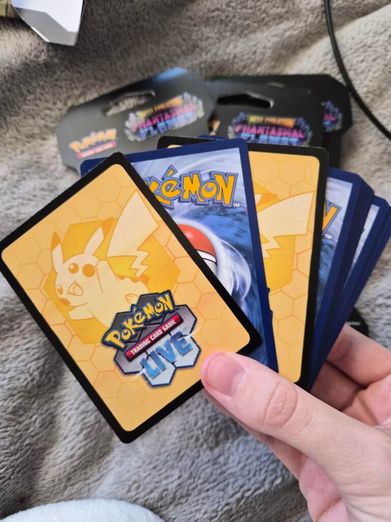 Opened up some Phantasmal Flames for the first time and got a two code cards in one pack? I got one of my chase card for the set tho so I guess it was a lucky pack?