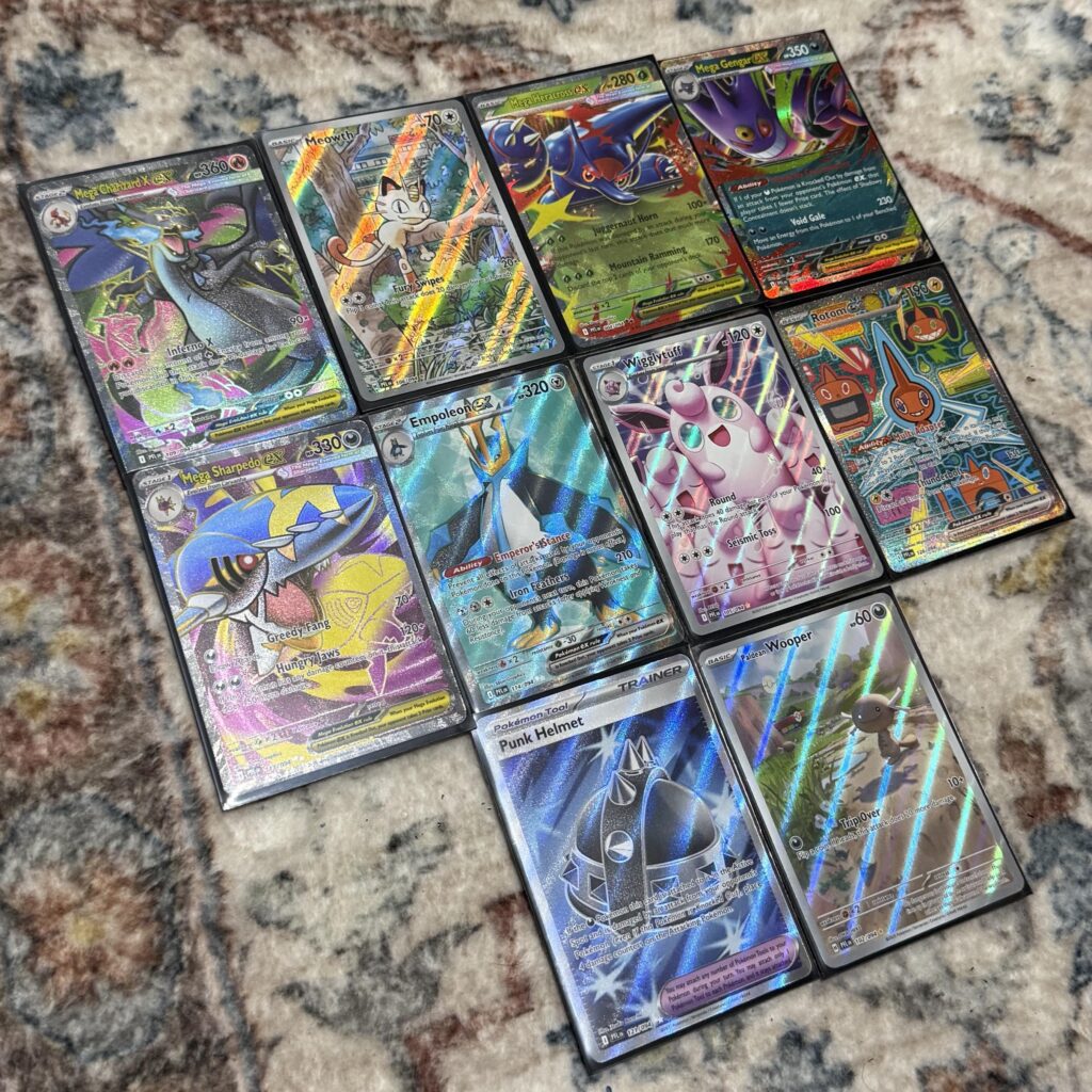 I haven't bought a pack of Pokemon cards since the early 2000's. The holos and full arts are crazy! How'd I do after an ETB and 10 solo packs?