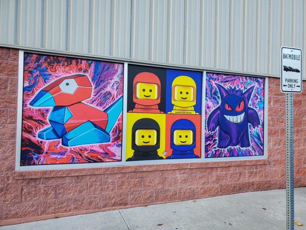 My Pokémon fan-art was chosen to be used as window decorations for a huge video games & collectibles store in my hometown! [OC]