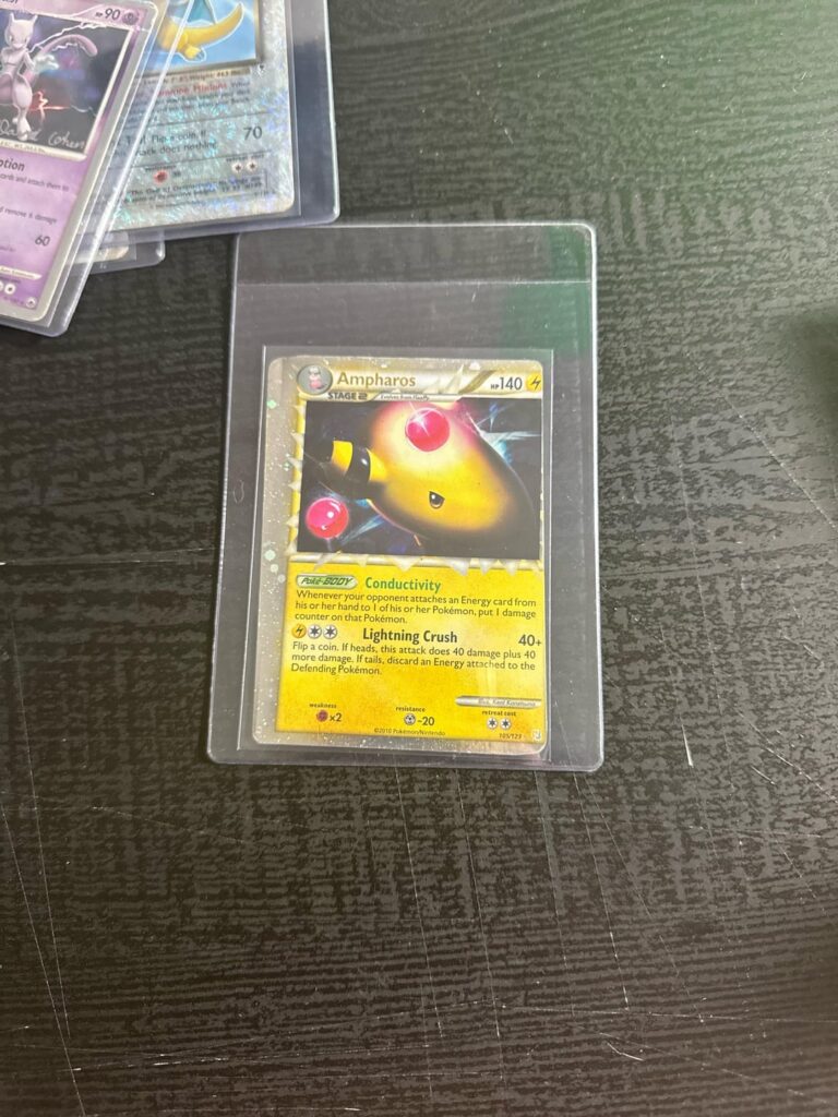 Ampharos 105/123 mis-cut