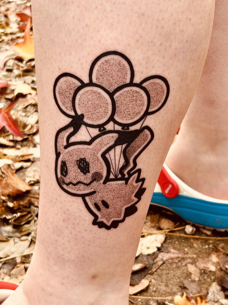 Flying Mimikyu tattoo by @psybeamtattoos