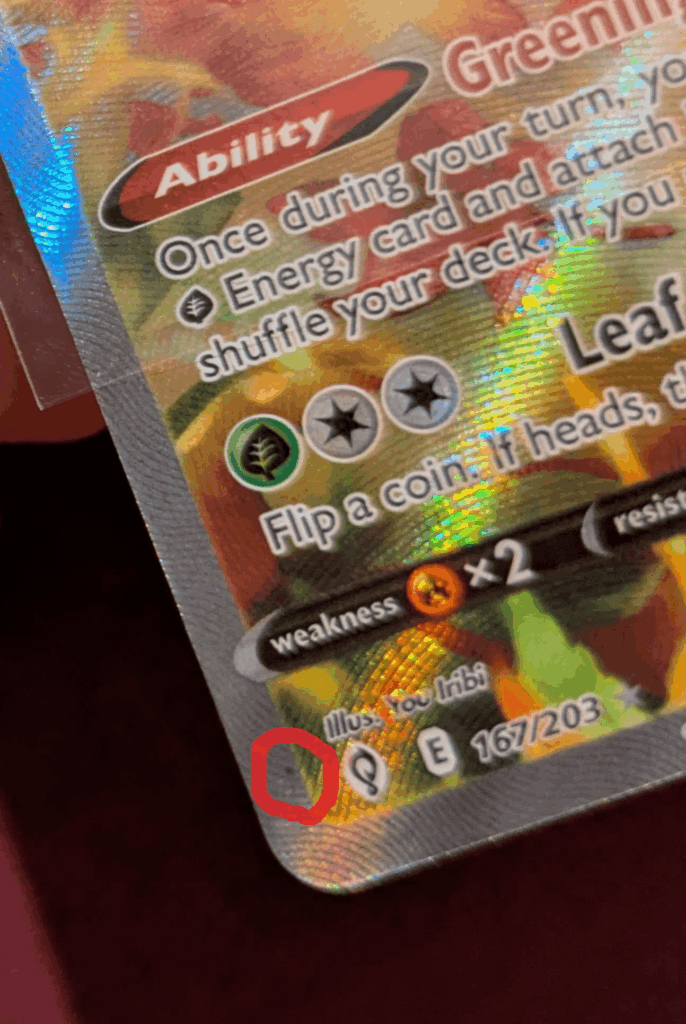 Black dot in holo foil, is this considered damage?