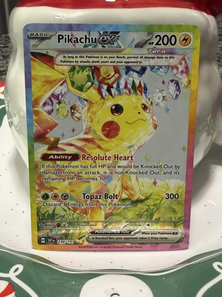 1 Mega Charizard UPC. No hits until I got to the 2 Surging Sparks packs.