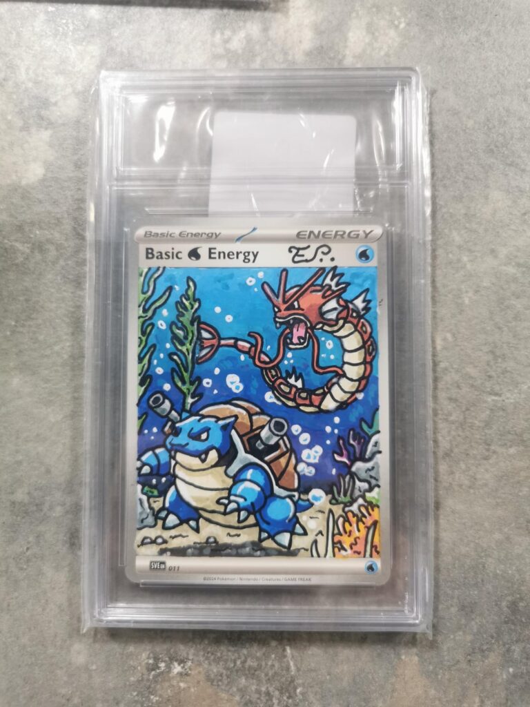 Few of my latest hand-painted custom Pokémon cards sladded up and waiting on there unique labels to be delivered.