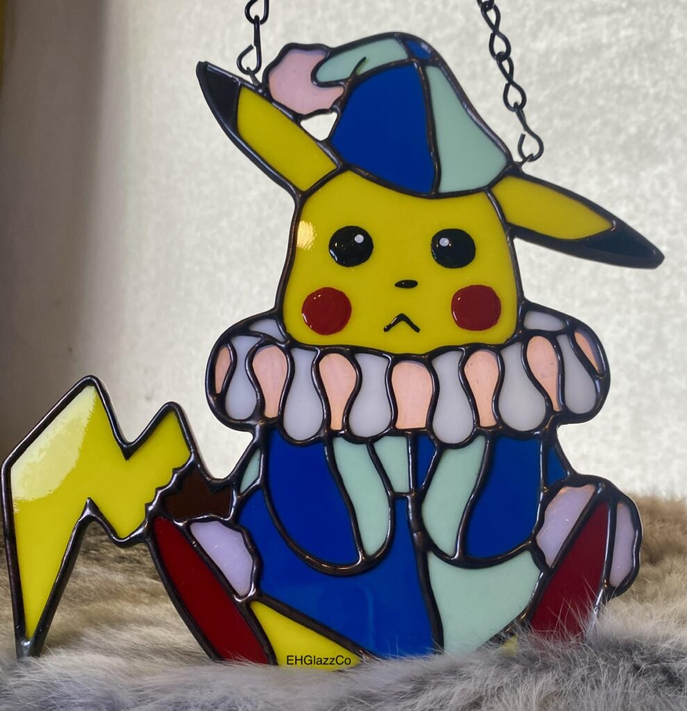 I’m a Stained glass artist and I made clown Pikachu from Lucario and the mystery of Mew!