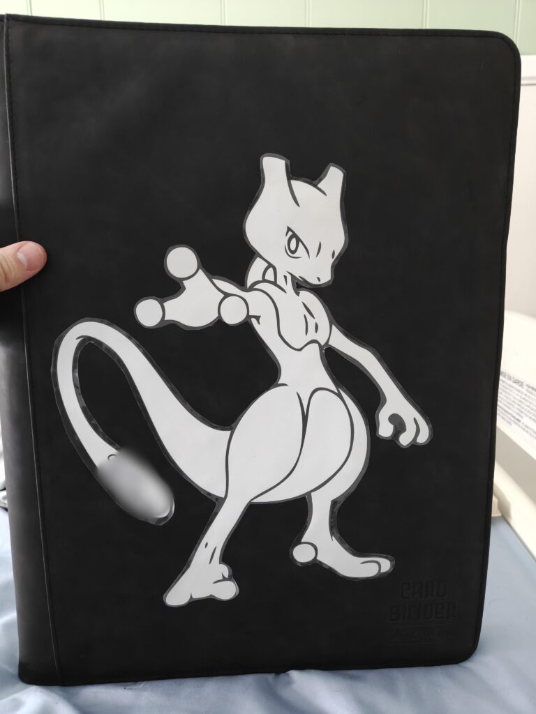 Made my son a custom binder to help him keep his collection together
