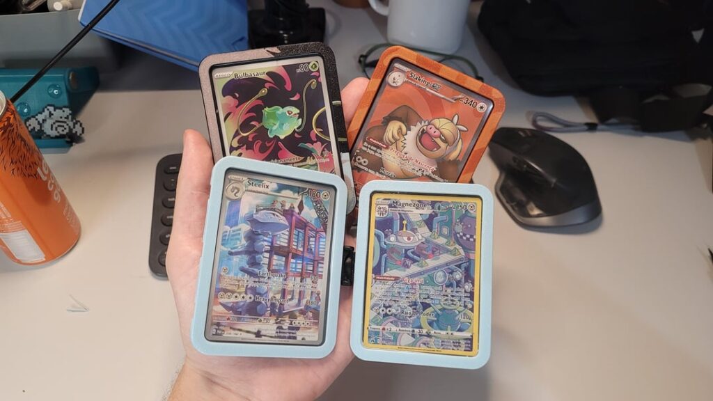 I started collecting late last year and wanted to design a modular, practical way to display my pulls. I’m calling it the "SnapLoader." What do you think of this concept?