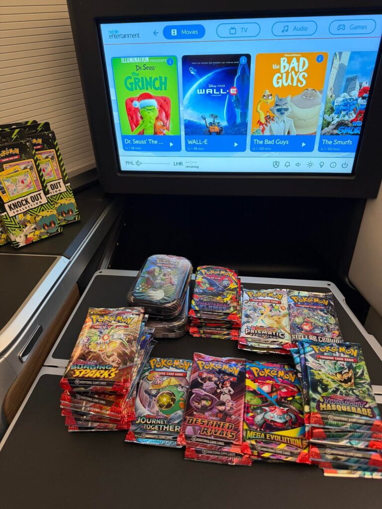 Got an 7 hour flight to London and brought a bunch of packs to rip on my flight. Rate my hits while I sleep.