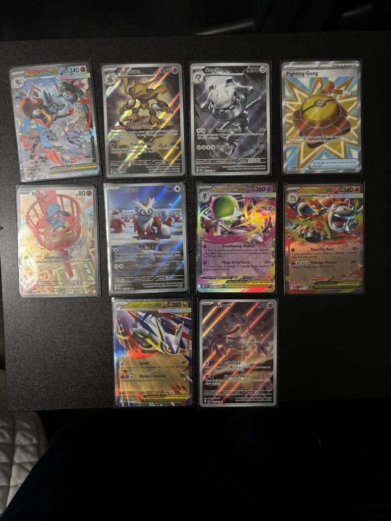 Pulls from 2 Mega Evolution ETBs + Surging Sparks Pack