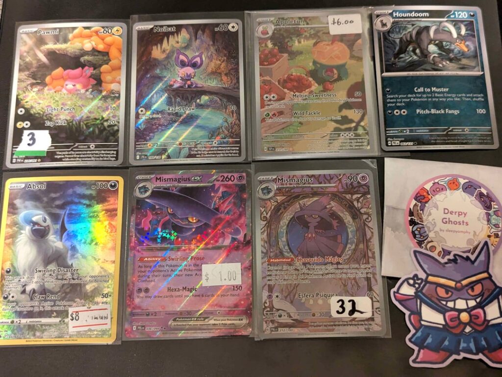 Went to my first card show today and found two of my grail cards! 🥰 (full art Mismagius and Absol)