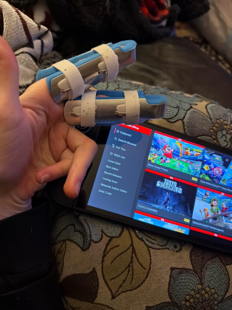 Fractured my two fingers and can’t play Pokemon for a couple weeks (😭) , any recommendations?