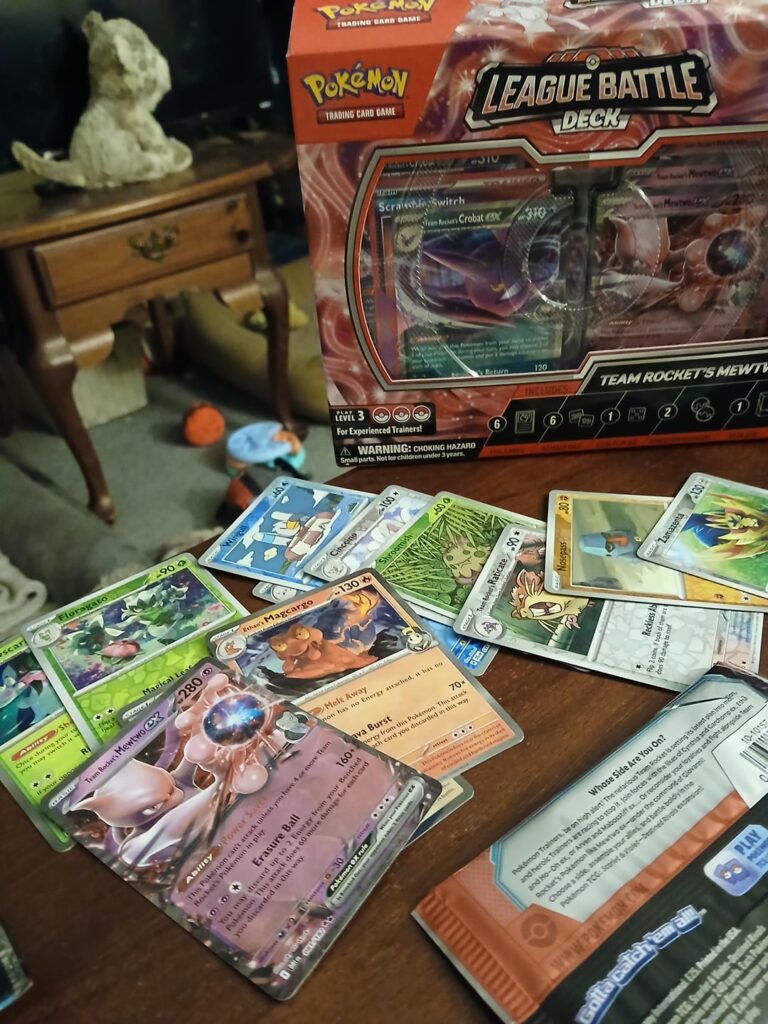 Nothing crazy just funny, I have a League event on Saturday so I grabbed a league battle deck for some trainer cards I wanted to bolster my deck and couple boosters. This happens of course lol a mewtwo ex out of a pack when the league deck gives you 3 and 1 from the TR tin lol so 5 🤣