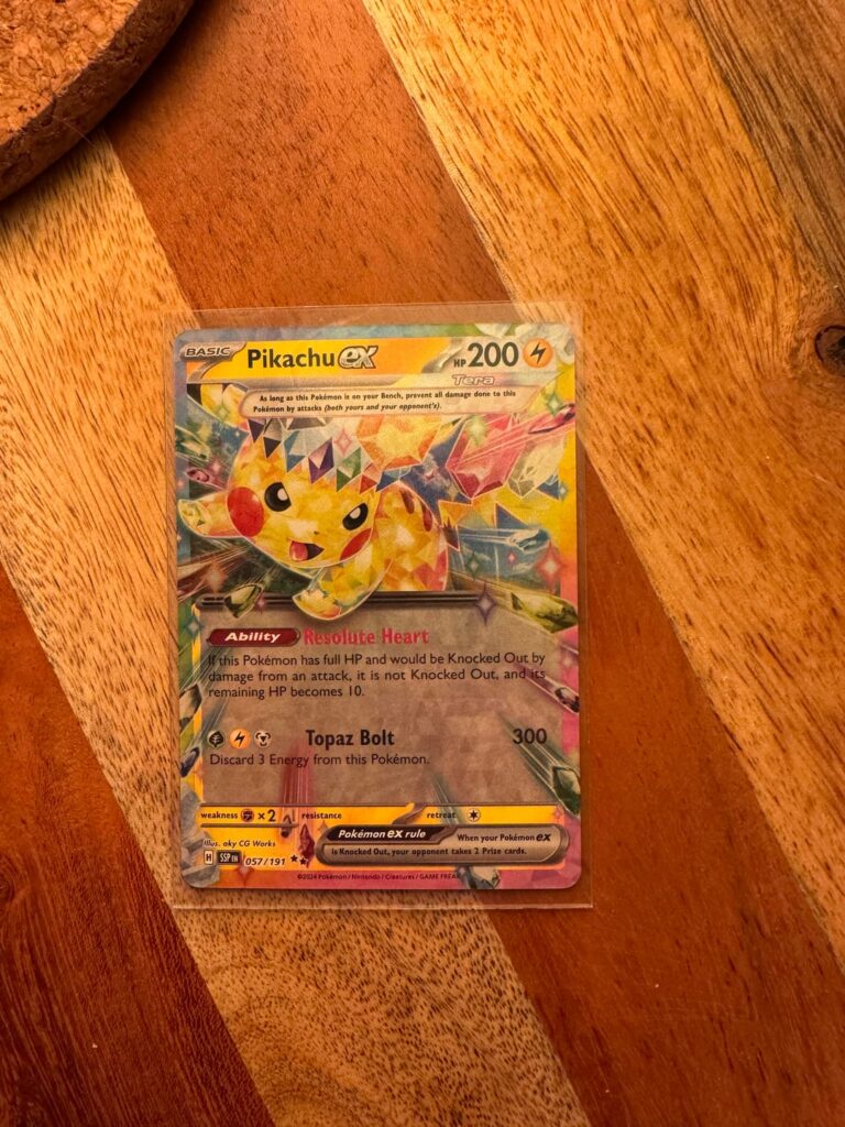 My first surging sparks pack ever and I pull this! Is it a rare pull?