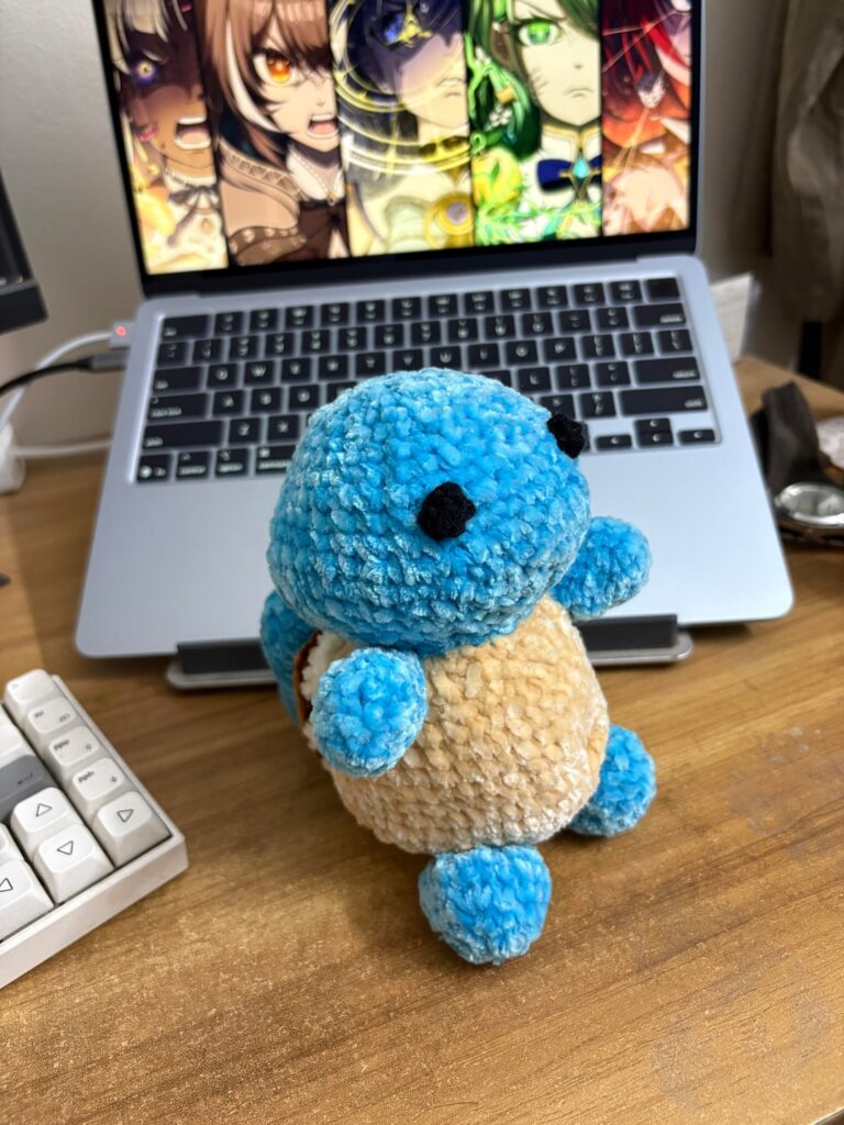 My younger sister knitted me a Squirtle plushie as a going away present