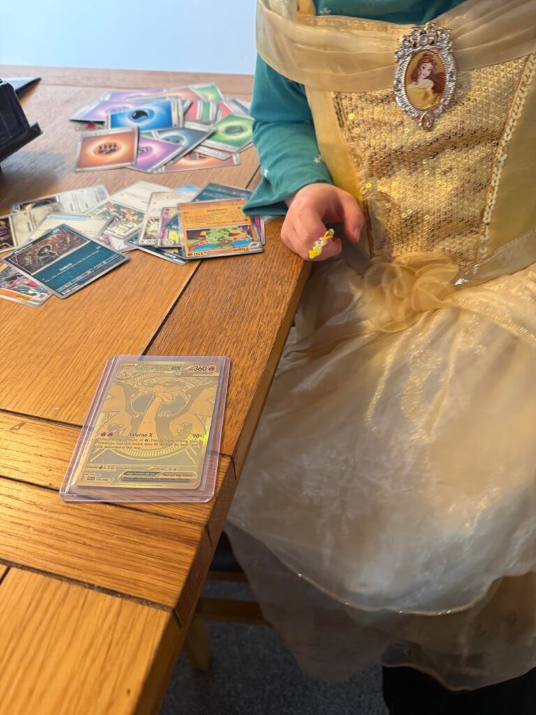 Daughter pulled a Gold Charizard!