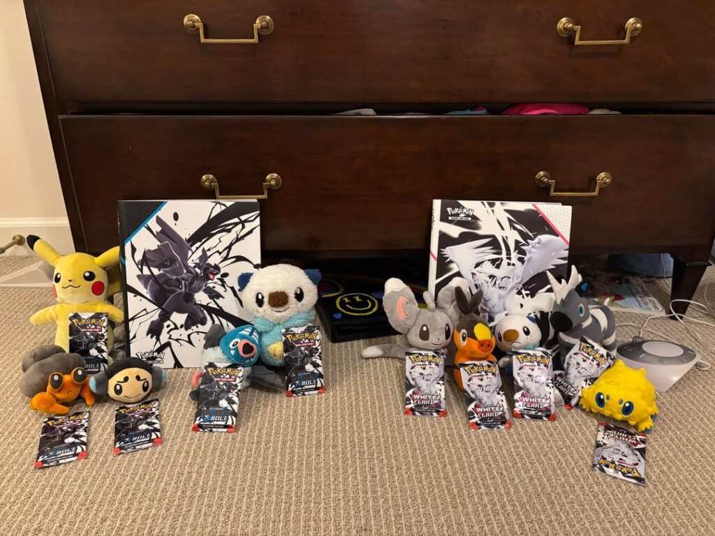 Black bolt vs White flare binder collection pulls with the Pokemon plushie pals