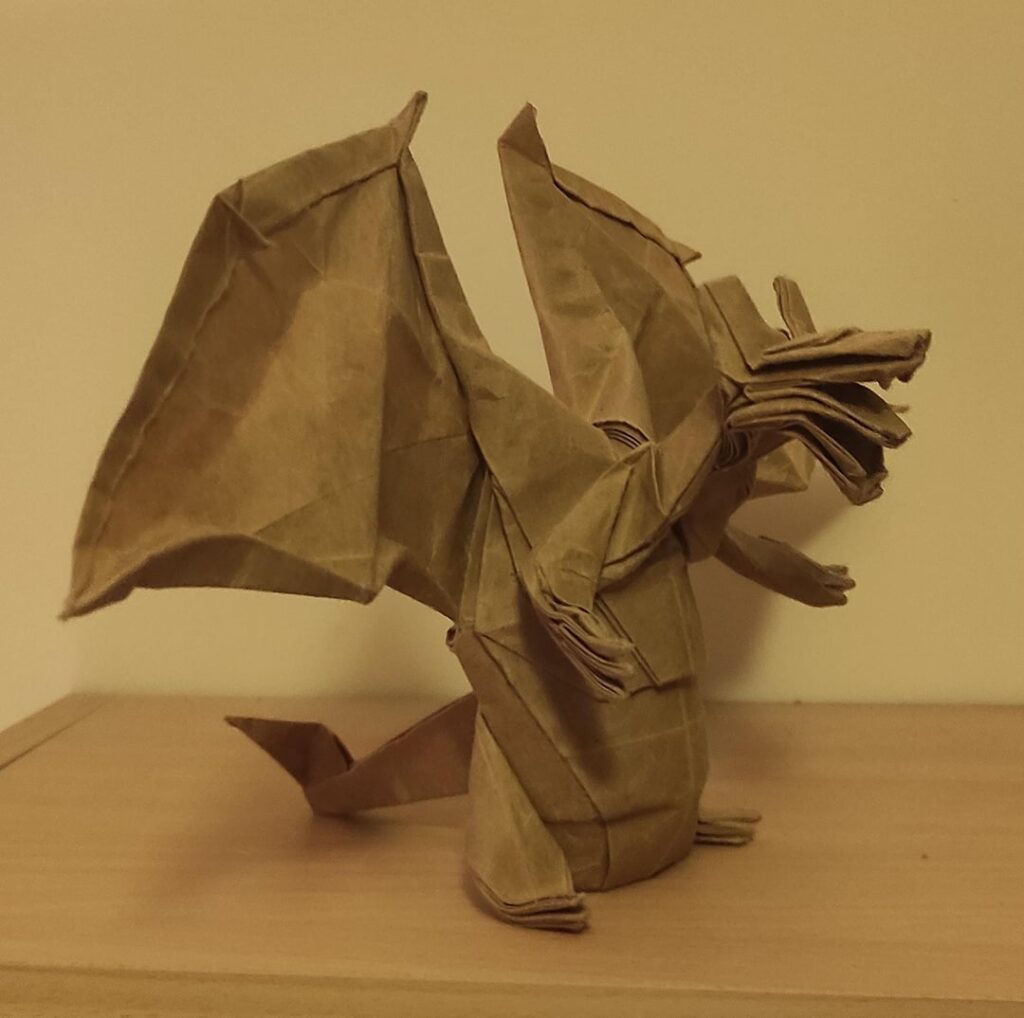 Origami charizard by tadashi mori folded by me from 55cm Kraft paper.