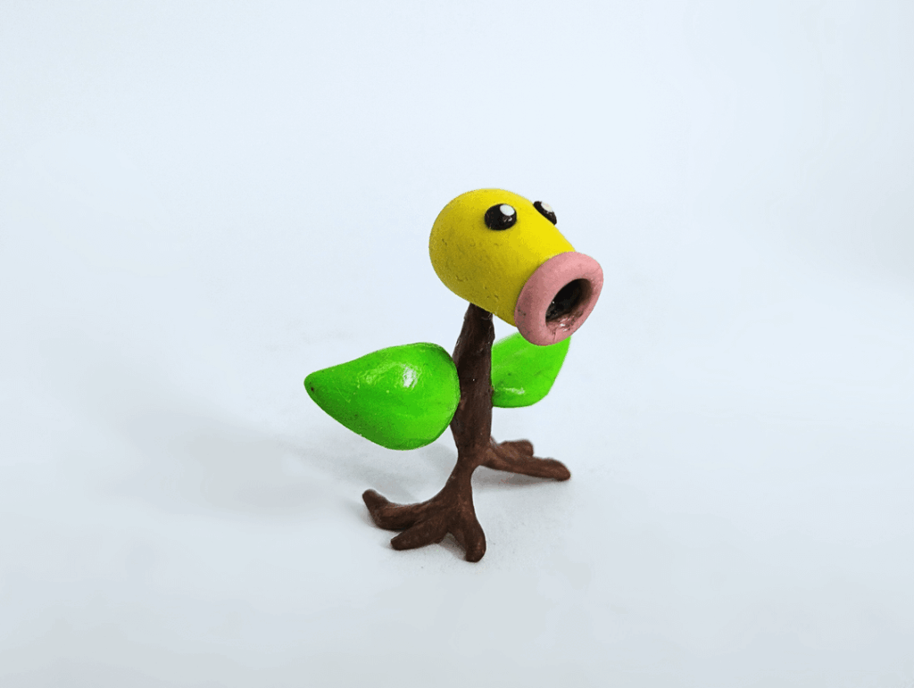 I made a Bellsprout with my hands, using colored clay