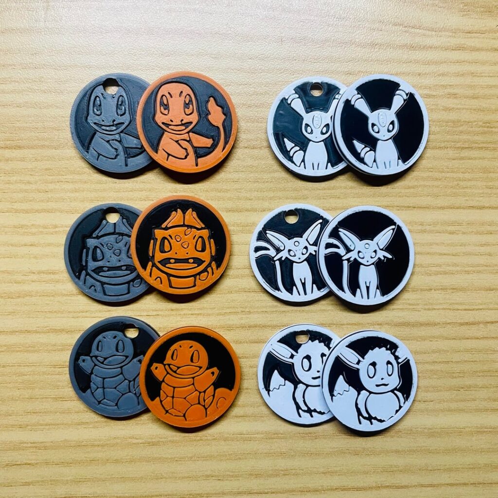 Pokemon keychains and coins [OC]