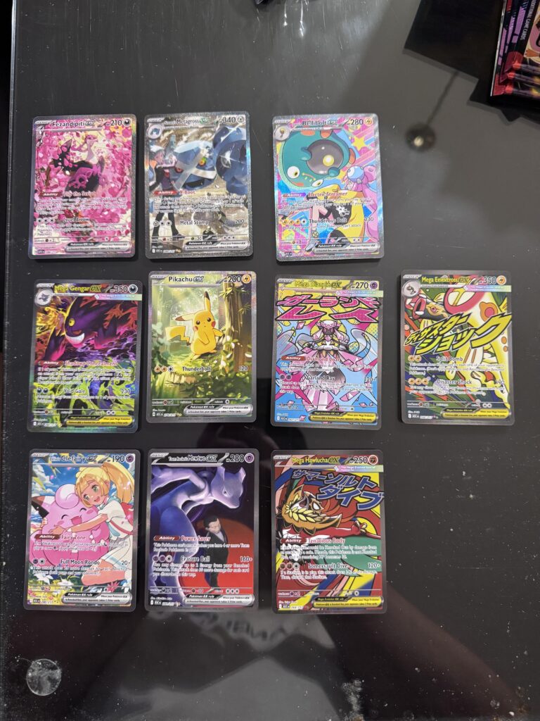 4 ETB’s and 36 packs in…. And 👀 The girlfriend luck is real 🤣 GOD PACK!!