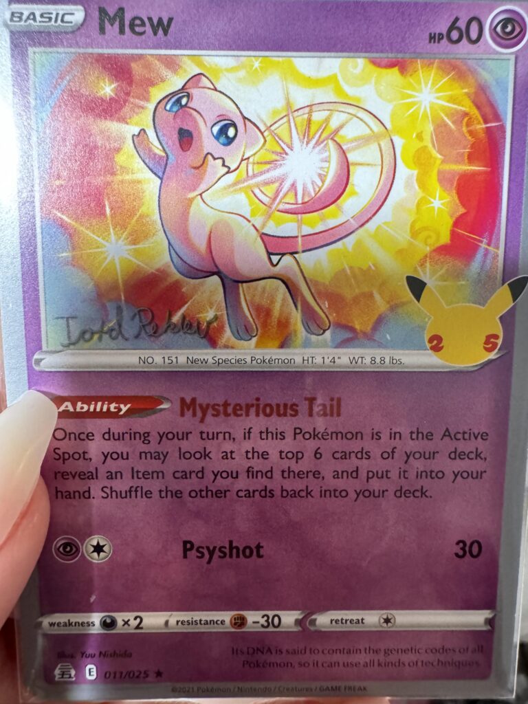 I bought this Mew but what’s the writing in the left corner mean?