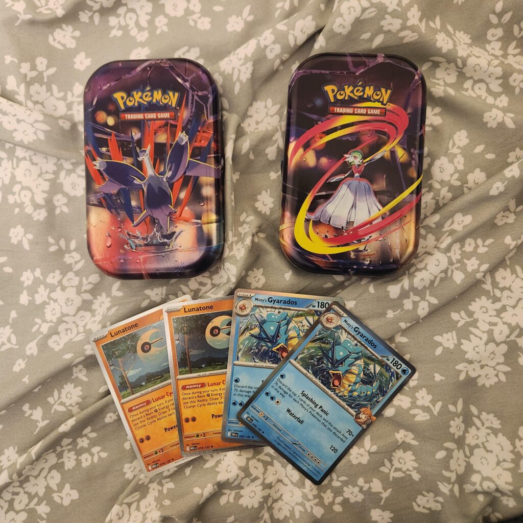 Opened 2 mega evolution mini tins..