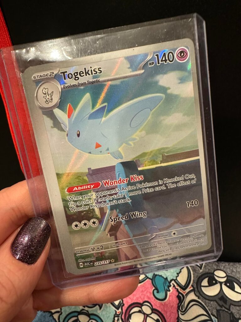 pulled this miscut togekiss the other day!! put it in a toploader to keep it safe but not quite sure what to do with it…