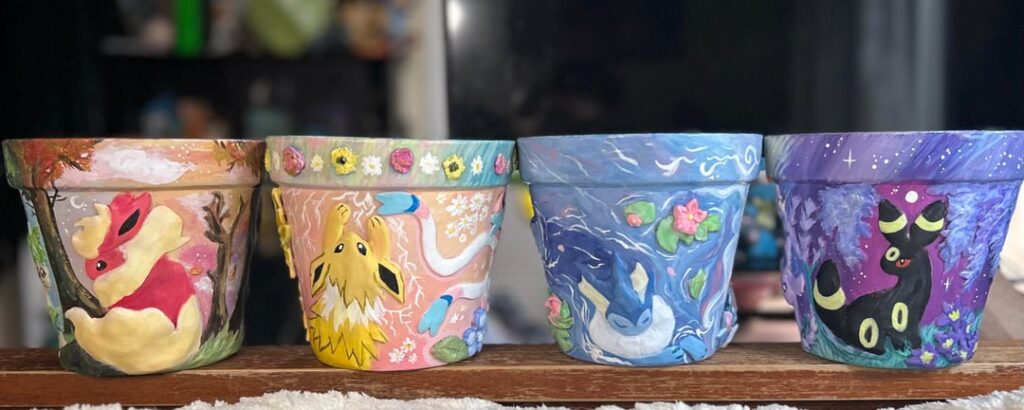 Some eeveelution pots I made with polymer clay!