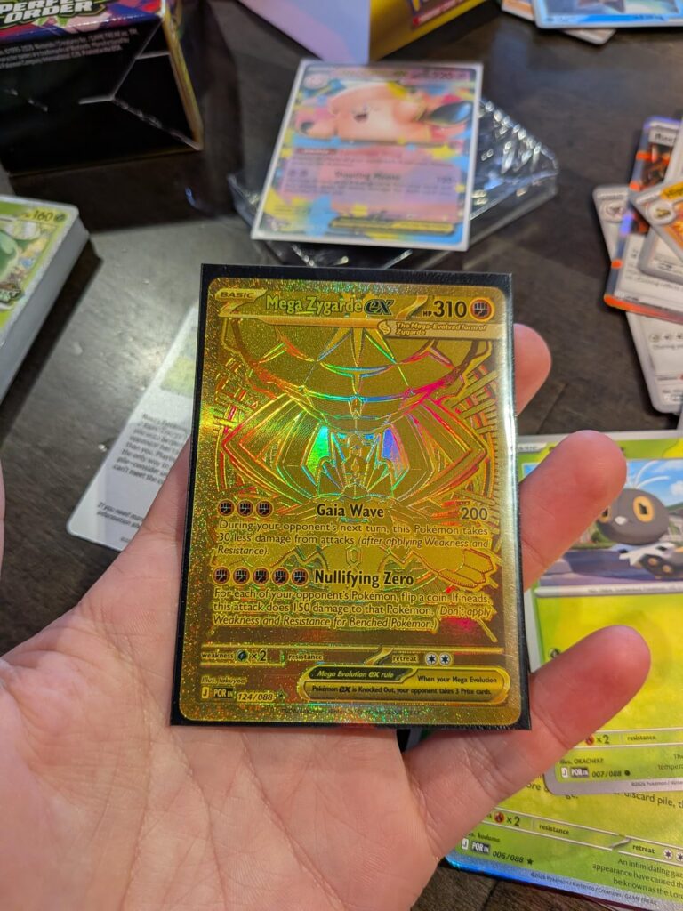 I just went to my first ever pokemon pre-release, and pulled the golden zygarde card, and then my friend did also!?