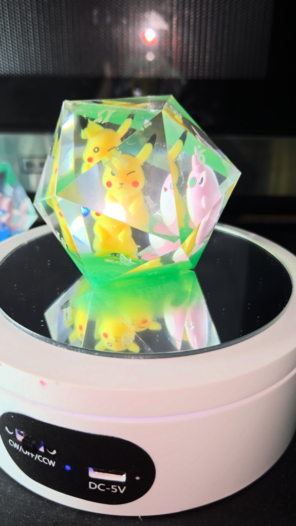 Pokemon Dice, My first attempt Fresh from the pot, not sanded or polished yet, whaddya think?
