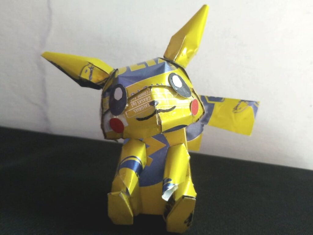 Pikachu sculpture made from soda cans