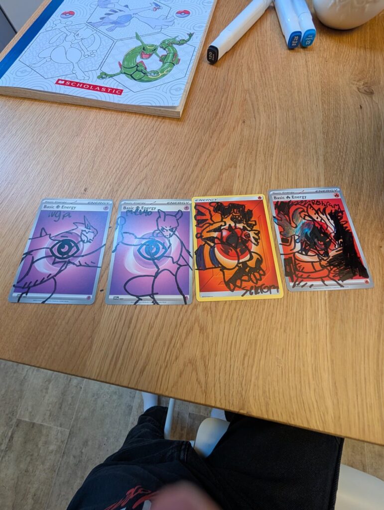 I drew cool pokemon on energy cards like em?