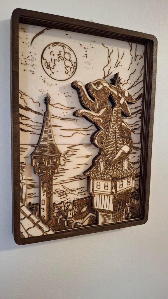 I turned the Moonbreon card into layered wooden wall art