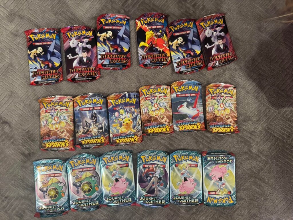 Opened the Costco 6 pack Poke Ball Tins