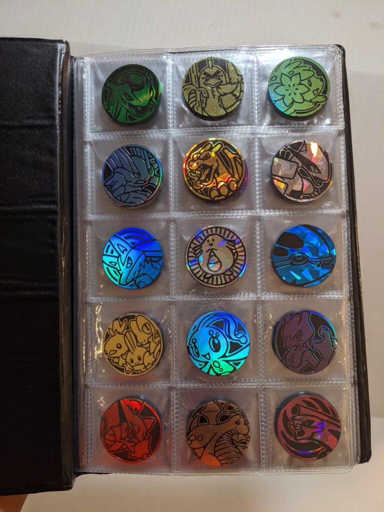 Got a binder for my pokemon coins. Does anyone else collect these?