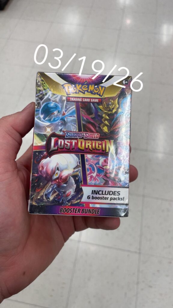 Found lost origin booster bundle under the shelf at target